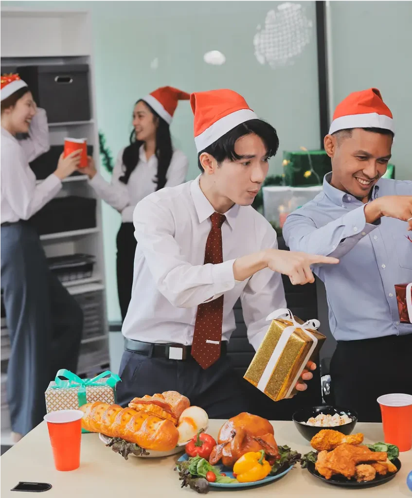 people celebrating and exchanging gifts